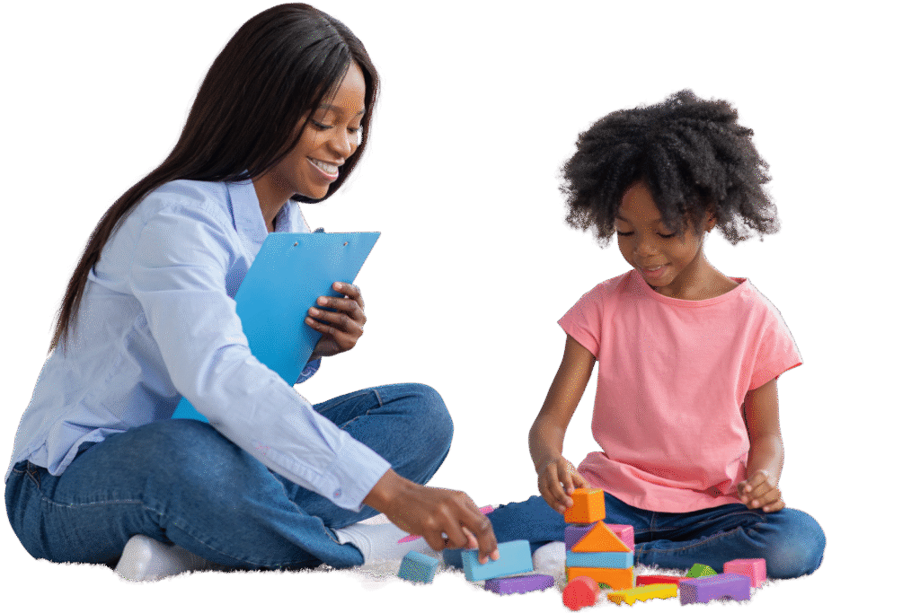 Therapist with a child playing